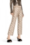 Cambio Faith golden lurex chain in car 